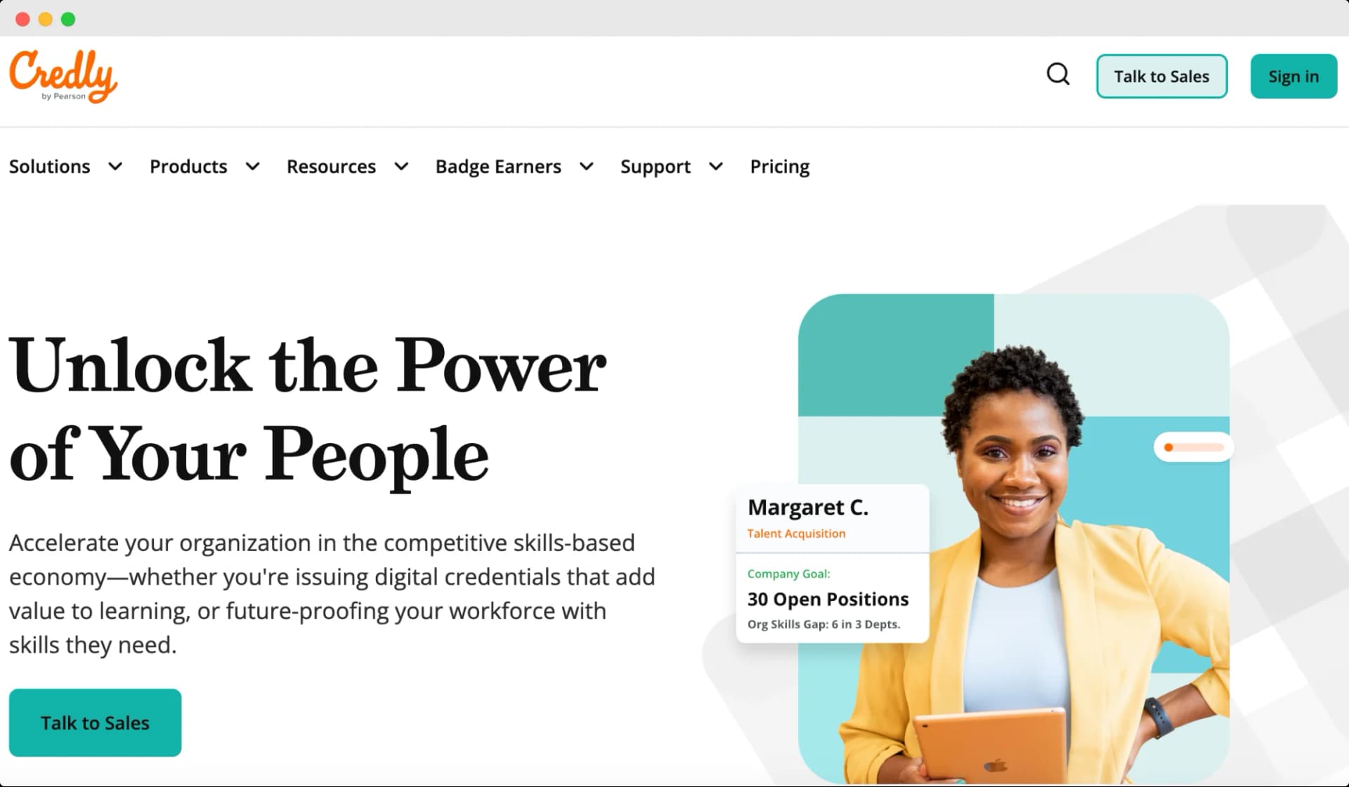 Credly's homepage featuring a smiling woman 